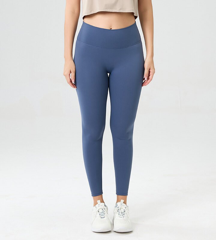Crafted from a premium, buttery-soft fabric, these high-waisted yoga leggings offer a second-skin feel with just the right amount of stretch. The wide, supportive waistband smooths your midsection, while the full-length design provides coverage and confidence for yoga, pilates, or everyday wear. Breathable, moisture-wicking, and available in versatile colors, they’re the ultimate blend of comfort and style for your active lifestyle.