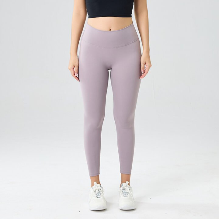 Crafted from a premium, buttery-soft fabric, these high-waisted yoga leggings offer a second-skin feel with just the right amount of stretch. The wide, supportive waistband smooths your midsection, while the full-length design provides coverage and confidence for yoga, pilates, or everyday wear. Breathable, moisture-wicking, and available in versatile colors, they’re the ultimate blend of comfort and style for your active lifestyle.