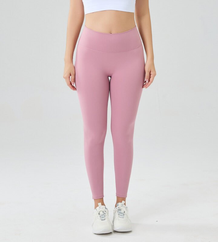 Crafted from a premium, buttery-soft fabric, these high-waisted yoga leggings offer a second-skin feel with just the right amount of stretch. The wide, supportive waistband smooths your midsection, while the full-length design provides coverage and confidence for yoga, pilates, or everyday wear. Breathable, moisture-wicking, and available in versatile colors, they’re the ultimate blend of comfort and style for your active lifestyle.